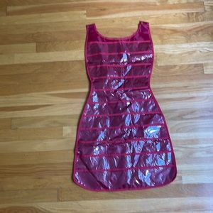 Holds necklaces, rings, bracelets, buttons, misc small items